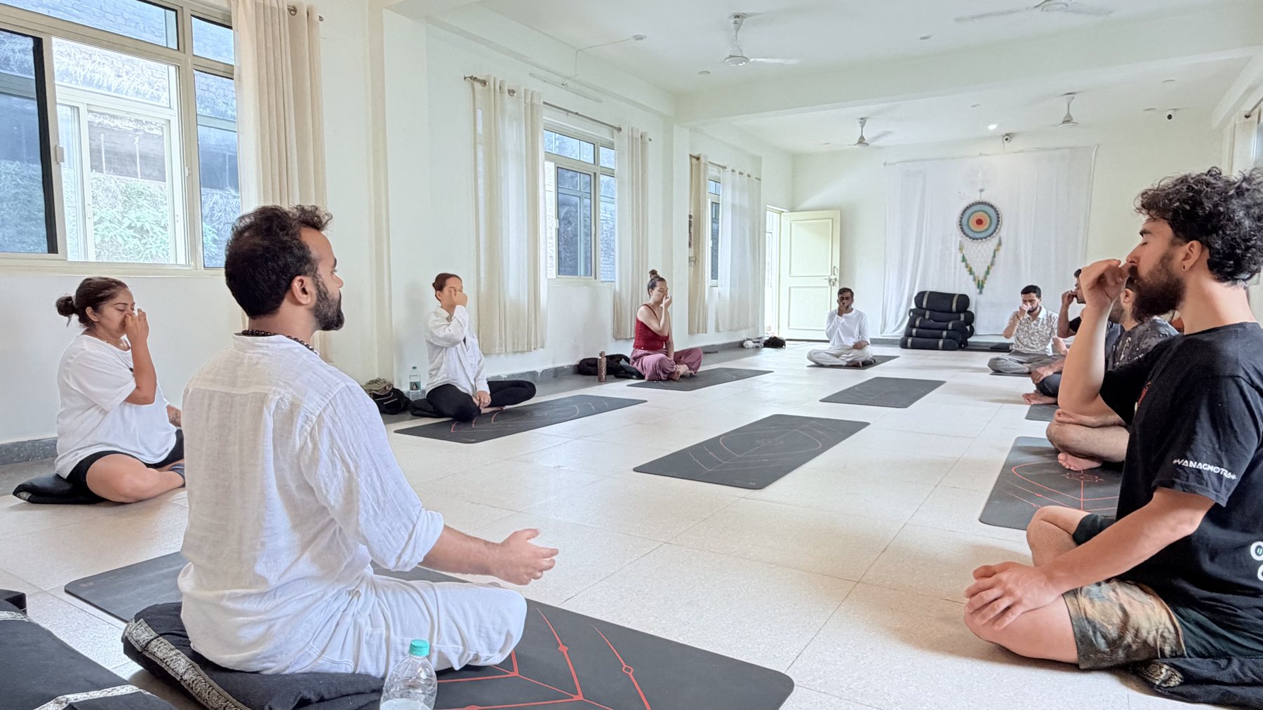 Group meditation session at Witness Yoga in Rishikesh